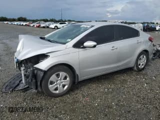 ✅ 2018 Kia Forte LX • VIN: 3KPFL4A76JE246211 • Lot: 81443115. Listed on Copart with 99,999 mi. Free auction sales archive from the USA and detailed vehicle history report at DreamBid. Image 1.