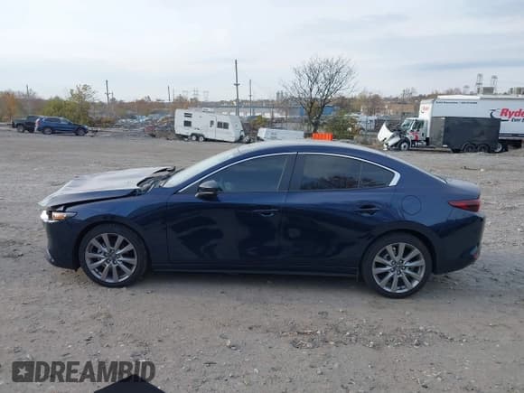 ✅ 2022 Mazda 3 Select • VIN: 3MZBPABL3NM309450 • Lot: 43650319. Listed on IAAI with 32,846 mi. Free auction sales archive from the USA and detailed vehicle history report at DreamBid. Image 14.