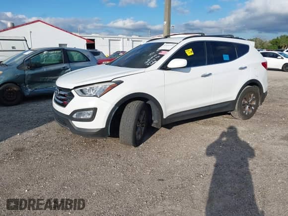 2015 Hyundai Santa Fe z VIN 5XYZU3LBXFG277476, wystawiony jako IAAI lot #43541323 z przebiegiem 100 864 mil mil oraz . Historia ofert i sprzedaży dostępna na DreamBid. Obrazek 17.