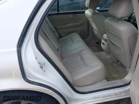 ✅ 2009 Cadillac DTS 1SA • VIN: 1G6KD57Y39U122883 • Lot: 41494002. Listed on IAAI with 106,296 mi. Free auction sales archive from the USA and detailed vehicle history report at DreamBid. Image 8.