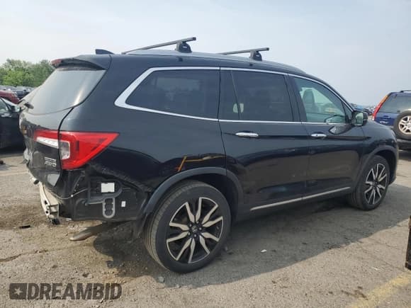 ✅ 2019 Honda Pilot Touring 7-Passenger • VIN: 5FNYF6H65KB095799 • Lot: 60322525. Listed on Copart with 143,987 mi. Free auction sales archive from the USA and detailed vehicle history report at DreamBid. Image 3.