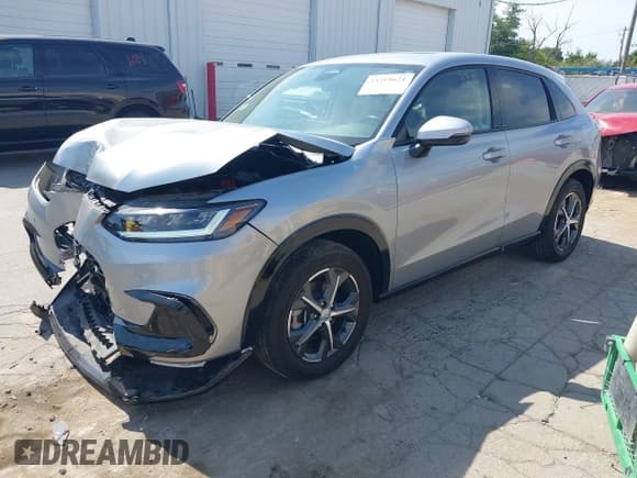 ✅ 2024 Honda HR-V EX-L • VIN: 3CZRZ2H79RM726096 • Lot: 43219621. Listed on IAAI with 5,457 mi. Free auction sales archive from the USA and detailed vehicle history report at DreamBid. Image 2.