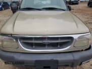 ✅ 2000 Ford Explorer XLT • VIN: 1FMZU63E5YZC67448 • Lot: 83935625. Wystawiony na Copart z przebiegiem 257 194 mil. Bezpłatny archiwum sprzedaży aukcyjnych z USA i szczegółowy raport historii pojazdu na DreamBid. Zdjęcie 12.