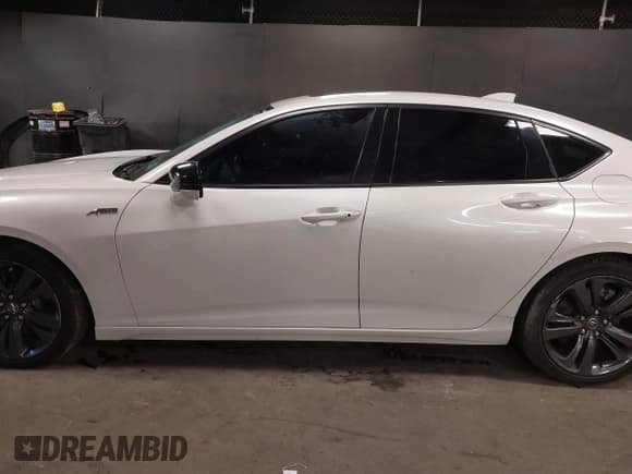 ✅ 2021 Acura TLX w/A-Spec Package • VIN: 19UUB5F51MA015457 • Lot: 40965263. Listed on IAAI with 24,537 mi. Free auction sales archive from the USA and detailed vehicle history report at DreamBid. Image 14.