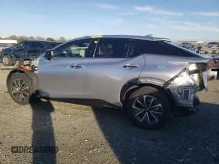 ✅ 2023 Lexus RZ 450e Premium • VIN: JTJAAAAB0PA016319 • Lot: 87233794. Wystawiony na Copart z przebiegiem 13 858 mil. Bezpłatny archiwum sprzedaży aukcyjnych z USA i szczegółowy raport historii pojazdu na DreamBid. Zdjęcie 2.