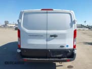 ✅ 2020 Ford Transit Cargo • VIN: 1FTBR1Y83LKA67103 • Lot: 42408599. Listed on IAAI with 76,837 mi. Free auction sales archive from the USA and detailed vehicle history report at DreamBid. Image 16.