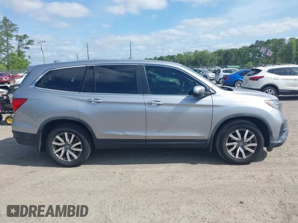 ✅ 2019 Honda Pilot EX-L • VIN: 5FNYF5H52KB042169 • Lot: 42128164. Listed on IAAI with 65,658 mi. Free auction sales archive from the USA and detailed vehicle history report at DreamBid. Image 13.