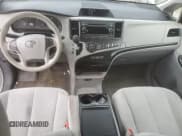 ✅ 2014 Toyota Sienna LE • VIN: 5TDKK3DC1ES482975 • Lot: 89934545. Listed on Copart with 128,305 mi. Free auction sales archive from the USA and detailed vehicle history report at DreamBid. Image 8.