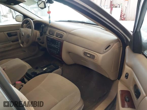 ✅ 2003 Mercury Sable LS Premium • VIN: 1MEHM59S73A620690 • Lot: 42740596. Listed on IAAI with 92,891 mi. Free auction sales archive from the USA and detailed vehicle history report at DreamBid. Image 5.