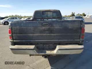 1996 Dodge 1500 z VIN 3B7HC13Y0TM120450, wystawiony jako Copart lot #78552594 z przebiegiem 317 248 mil mil oraz Szkoda całkowita • Salvage title. Historia ofert i sprzedaży dostępna na DreamBid. Obrazek 6.