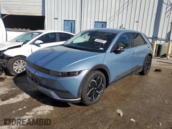 2022 Hyundai Ioniq 5 SEL z VIN KM8KNDAF2NU054853, wystawiony jako Copart lot #44260883 z przebiegiem 16 452 mil mil oraz . Historia ofert i sprzedaży dostępna na DreamBid. Obrazek 1.