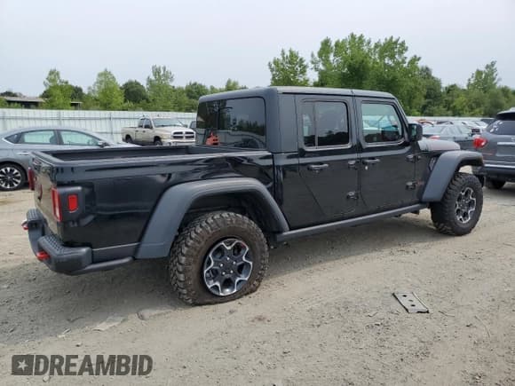 ✅ 2023 Jeep Gladiator Rubicon • VIN: 1C6JJTBG8PL587013 • Lot: 64745525. Listed on Copart with 8,922 mi. Free auction sales archive from the USA and detailed vehicle history report at DreamBid. Image 3.