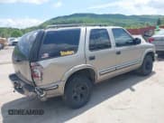 ✅ 1999 Chevrolet Blazer LS • VIN: 1GNCS13WXX2190277 • Лот: 42221860. Опубликован ранее на IAAI с пробегом 298 876 миль. Бесплатный доступ к архиву аукционных продаж из США и подробный отчёт об истории автомобиля на DreamBid. Изображение 4.