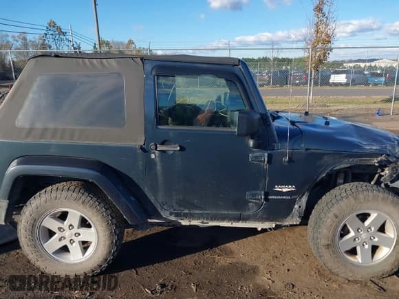 ✅ 2007 Jeep Wrangler Sahara • VIN: 1J8FA54147L171035 • Лот: 43567952. Опубликован ранее на IAAI с пробегом 280 755 миль. Бесплатный доступ к архиву аукционных продаж из США и подробный отчёт об истории автомобиля на DreamBid. Изображение 14.