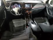 ✅ 2016 Mazda CX-5 Grand Touring • VIN: JM3KE4DYXG0834277 • Lot: 85742985. Listed on Copart with 102,312 mi. Free auction sales archive from the USA and detailed vehicle history report at DreamBid. Image 8.