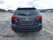 ✅ 2014 Mazda CX-9 Grand Touring • VIN: JM3TB2DA2E0433985 • Lot: 43062902. Wystawiony na IAAI z przebiegiem 127 332 mil. Bezpłatny archiwum sprzedaży aukcyjnych z USA i szczegółowy raport historii pojazdu na DreamBid. Zdjęcie 17.