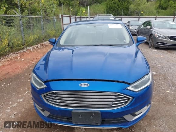 ✅ 2017 Ford Fusion Hybrid Titanium • VIN: 3FA6P0RU4HR388525 • Lot: 43136734. Wystawiony na IAAI z przebiegiem 206 994 mil. Bezpłatny archiwum sprzedaży aukcyjnych z USA i szczegółowy raport historii pojazdu na DreamBid. Zdjęcie 12.