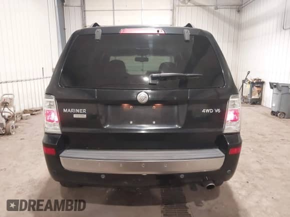 2010 Mercury Mariner Premier with VIN 4M2CN9HG2AKJ19690, listed as a IAAI auction lot 43221081 with 136,828 mi miles and . Bid and sale history available at DreamBid. Image 16.