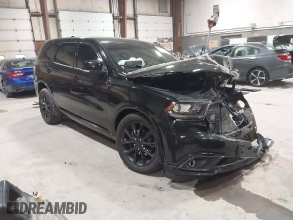 2017 Dodge Durango R/T with VIN 1C4SDJCT9HC945581, listed as a IAAI auction lot 43420044 with 143,365 mi miles and . Bid and sale history available at DreamBid. Image 1.