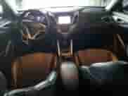 2012 Hyundai Veloster w/Red Int z VIN KMHTC6AD1CU054411, wystawiony jako Copart lot #73357964 z przebiegiem 12 486 mil mil oraz Szkoda całkowita • Salvage title. Historia ofert i sprzedaży dostępna na DreamBid. Obrazek 8.