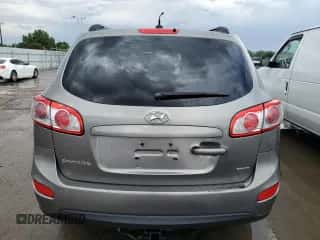 2012 Hyundai Santa Fe GLS z VIN 5XYZGDAB0CG157178, wystawiony jako Copart lot #58784664 z przebiegiem 166 163 mil mil oraz Szkoda całkowita • Salvage title. Historia ofert i sprzedaży dostępna na DreamBid. Obrazek 6.