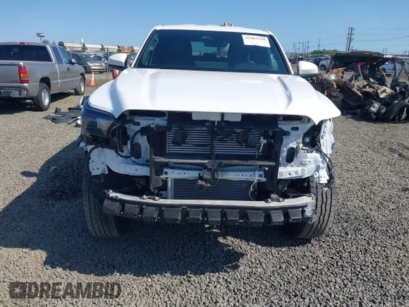 ✅ 2024 Toyota Tacoma TRD Sport Hybrid • VIN: 3TYLC5LN3RT001392 • Lot: 42401518. Listed on IAAI with 3,310 mi. Free auction sales archive from the USA and detailed vehicle history report at DreamBid. Image 13.