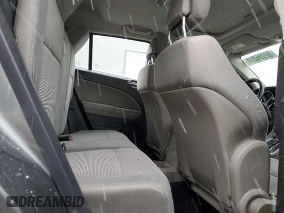 ✅ 2012 Dodge Caliber SXT • VIN: 1C3CDWDA3CD531153 • Лот: 82926094. Опубликован ранее на Copart с пробегом 184 746 миль. Бесплатный доступ к архиву аукционных продаж из США и подробный отчёт об истории автомобиля на DreamBid. Изображение 11.