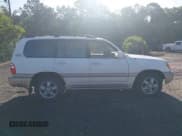 ✅ 2003 Toyota Land Cruiser • VIN: JTEHT05J032033449 • Lot: 42807898. Listed on IAAI with 357,688 mi. Free auction sales archive from the USA and detailed vehicle history report at DreamBid. Image 13.