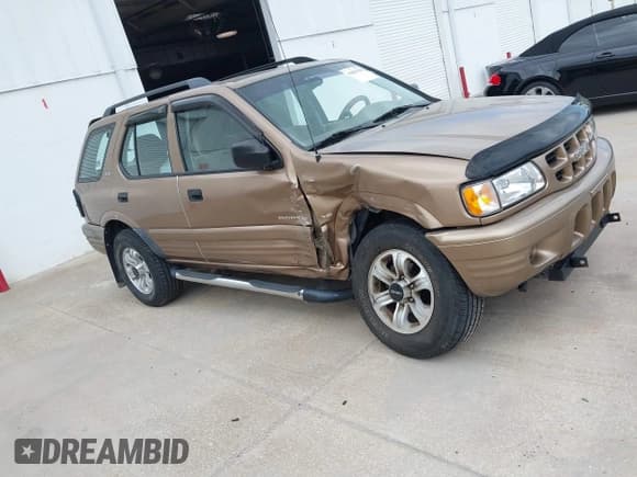 ✅ 2000 Isuzu Rodeo S • VIN: 4S2CK58W3Y4316966 • Lot: 42003598. Listed on IAAI with 106,187 mi. Free auction sales archive from the USA and detailed vehicle history report at DreamBid. Image 13.