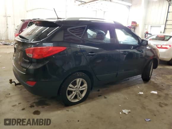 2011 Hyundai Tucson GLS z VIN KM8JUCACXBU307959, wystawiony jako Copart lot #67553525 z przebiegiem 171 724 mil mil oraz Nie do naprawy • Non repairable. Historia ofert i sprzedaży dostępna na DreamBid. Obrazek 3.