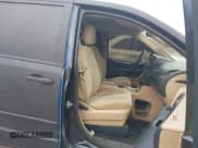 ✅ 2014 Dodge Grand Caravan SXT • VIN: 2C4RDGCG6ER253558 • Lot: 43648780. Wystawiony na IAAI z przebiegiem 145 667 mil. Bezpłatny archiwum sprzedaży aukcyjnych z USA i szczegółowy raport historii pojazdu na DreamBid. Zdjęcie 5.