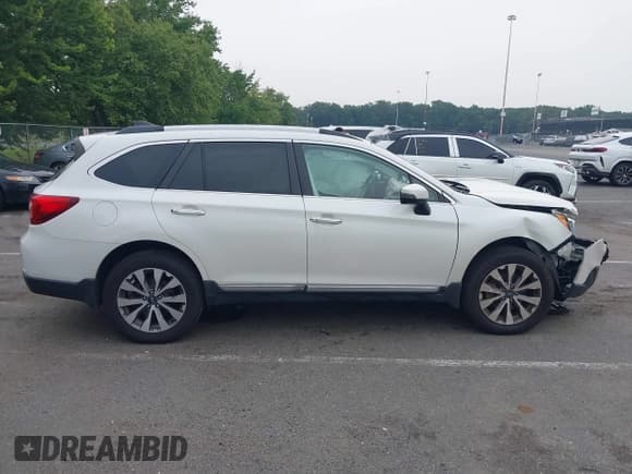 ✅ 2017 Subaru Outback Touring • VIN: 4S4BSETC2H3341332 • Lot: 42895227. Listed on IAAI with 101,057 mi. Free auction sales archive from the USA and detailed vehicle history report at DreamBid. Image 13.