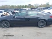 ✅ 2021 Toyota Avalon Hybrid XSE • VIN: 4T1EA1AB2MU002741 • Lot: 41865444. Wystawiony na IAAI z przebiegiem 141 196 mil. Bezpłatny archiwum sprzedaży aukcyjnych z USA i szczegółowy raport historii pojazdu na DreamBid. Zdjęcie 14.