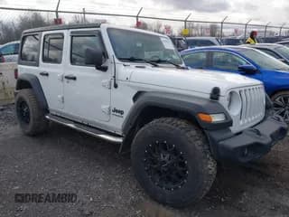✅ 2022 Jeep Wrangler Unlimited Sport S • VIN: 1C4HJXDG3NW185374 • Lot: 43696127. Listed on IAAI with 52,980 mi. Free auction sales archive from the USA and detailed vehicle history report at DreamBid. Image 1.