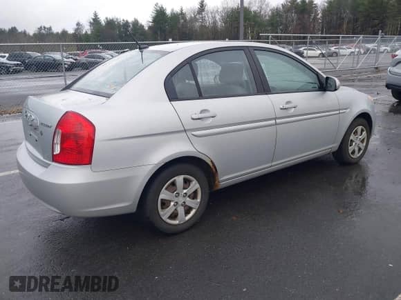2010 Hyundai Accent GLS with VIN KMHCN4AC2AU452052, listed as a IAAI auction lot 43535862 with 209,447 mi miles and . Bid and sale history available at DreamBid. Image 4.