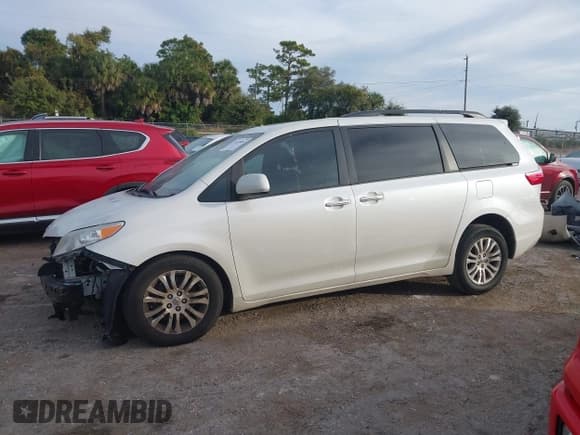 ✅ 2016 Toyota Sienna XLE • VIN: 5TDYK3DC9GS723758 • Lot: 43630852. Listed on IAAI with 143,860 mi. Free auction sales archive from the USA and detailed vehicle history report at DreamBid. Image 15.