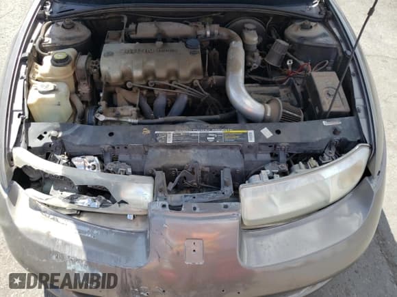 ✅ 1999 Saturn SC • VIN: 1G8ZN1288XZ310351 • Лот: 76677414. Опубликован ранее на Copart с пробегом Не указан. Бесплатный доступ к архиву аукционных продаж из США и подробный отчёт об истории автомобиля на DreamBid. Изображение 11.