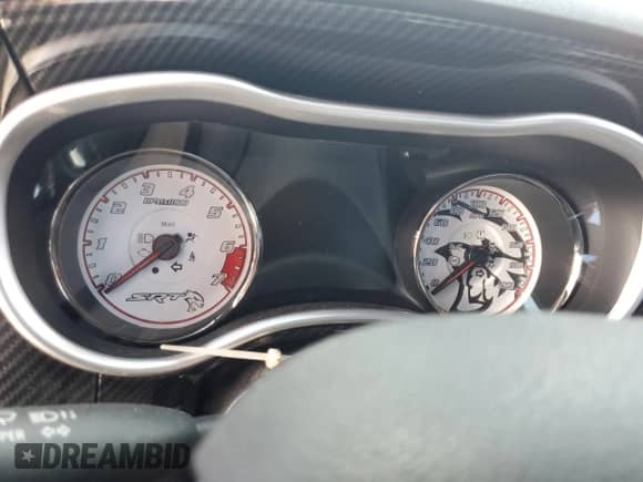 2015 Dodge Charger SRT Hellcat z VIN 2C3CDXL91FH795556, wystawiony jako Copart lot #77477774 z przebiegiem Nie podano mil oraz Szkoda całkowita • Salvage title. Historia ofert i sprzedaży dostępna na DreamBid. Obrazek 9.