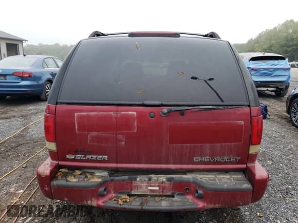 2002 Chevrolet Blazer LS z VIN 1GNDT13W32K241483, wystawiony jako Copart lot #73992044 z przebiegiem 191 544 mil mil oraz Szkoda całkowita • Salvage title. Historia ofert i sprzedaży dostępna na DreamBid. Obrazek 6.