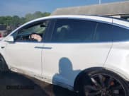 ✅ 2018 Tesla Model X 75D • VIN: 5YJXCBE23JF100303 • Лот: 42666935. Опубликован ранее на IAAI с пробегом Не указан. Бесплатный доступ к архиву аукционных продаж из США и подробный отчёт об истории автомобиля на DreamBid. Изображение 13.