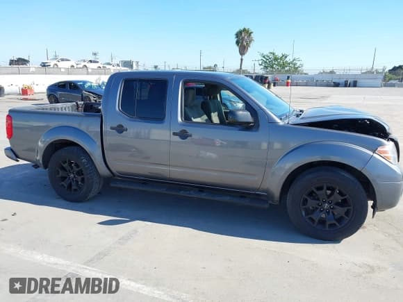 ✅ 2021 Nissan Frontier SV • VIN: 1N6ED0EA7MN706206 • Lot: 43094070. Listed on IAAI with 90,051 mi. Free auction sales archive from the USA and detailed vehicle history report at DreamBid. Image 13.