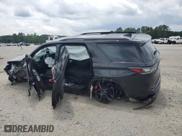 2021 Chevrolet Traverse Premier z VIN 1GNERKKW2MJ262862, wystawiony jako Copart lot #58779765 z przebiegiem 76 927 mil mil oraz Szkoda całkowita • Salvage title. Historia ofert i sprzedaży dostępna na DreamBid. Obrazek 2.