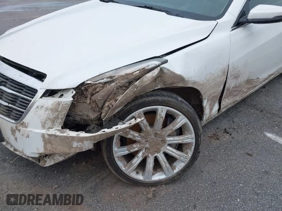 ✅ 2015 Cadillac ATS Standard AWD • VIN: 1G6AG1RX0F0127073 • Lot: 41296448. Listed on IAAI with 119,718 mi. Free auction sales archive from the USA and detailed vehicle history report at DreamBid. Image 17.