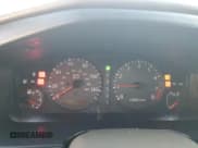 ✅ 1999 Infiniti G20 • VIN: JNKCP11A7XT020372 • Lot: 73639514. Listed on Copart with 174,467 mi. Free auction sales archive from the USA and detailed vehicle history report at DreamBid. Image 9.