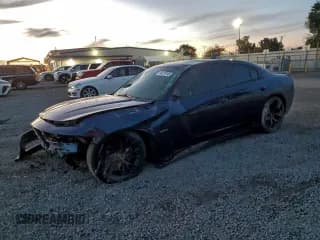 ✅ 2015 Dodge Charger RT • VIN: 2C3CDXCT5FH838825 • Lot: 94729745. Listed on Copart with 139,958 mi. Free auction sales archive from the USA and detailed vehicle history report at DreamBid. Image 1.