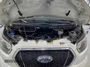 ✅ 2023 Ford Transit Passenger XLT • VIN: 1FBAX2YGXPKA58486 • Lot: 94293235. Listed on Copart with 51,472 mi. Free auction sales archive from the USA and detailed vehicle history report at DreamBid. Image 12.