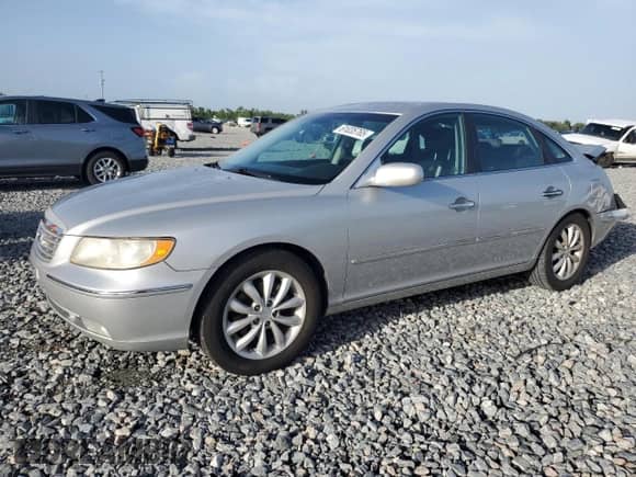 2006 Hyundai Azera SE с VIN KMHFC46F96A037972, выставлен на аукционе Copart как лот 61035765 с пробегом 140 857 миль миль и Списание • Salvage title. История ставок и продаж доступна на DreamBid. Изображение 1.