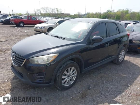 ✅ 2016 Mazda CX-5 Sport • VIN: JM3KE4BY8G0746377 • Lot: 41990988. Listed on IAAI with 144,558 mi. Free auction sales archive from the USA and detailed vehicle history report at DreamBid. Image 17.
