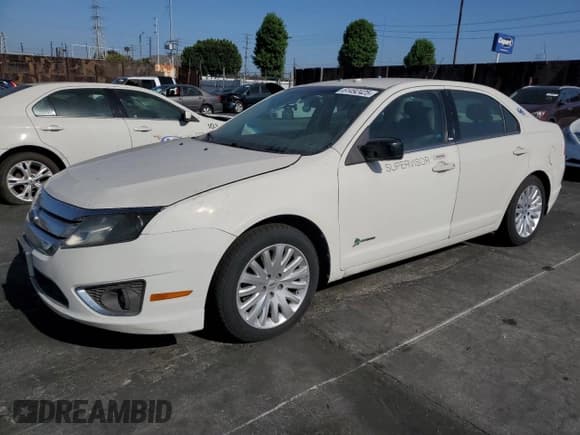 ✅ 2012 Ford Fusion Hybrid • VIN: 3FADP0L38CR171141 • Лот: 61492425. Опубликован ранее на Copart с пробегом 275 312 миль. Бесплатный доступ к архиву аукционных продаж из США и подробный отчёт об истории автомобиля на DreamBid. Изображение 1.