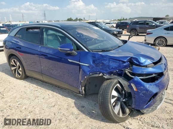 ✅ 2022 Volkswagen ID.4 Pro S • VIN: WVGUNPE28NP070331 • Лот: 66458265. Опубликован ранее на Copart с пробегом 26 559 миль. Бесплатный доступ к архиву аукционных продаж из США и подробный отчёт об истории автомобиля на DreamBid. Изображение 4.